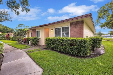 Gorgeous end-unit villa in a prime location with stunning on Highland Lakes Executive Golf Course in Florida - for sale on GolfHomes.com, golf home, golf lot