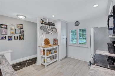 Gorgeous end-unit villa in a prime location with stunning on Highland Lakes Executive Golf Course in Florida - for sale on GolfHomes.com, golf home, golf lot