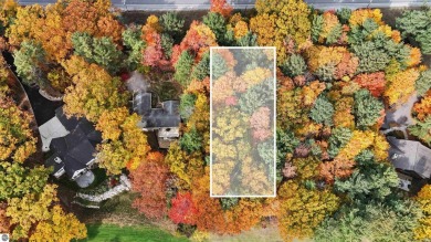 Located in the heart of Leland, this vacant parcel is one of a on Leland Country Club in Michigan - for sale on GolfHomes.com, golf home, golf lot