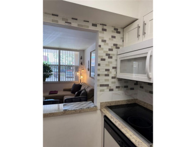 Spacious 1/1 ground floor condo with lots of sunlight and nice on Sunrise Lakes Phase III in Florida - for sale on GolfHomes.com, golf home, golf lot