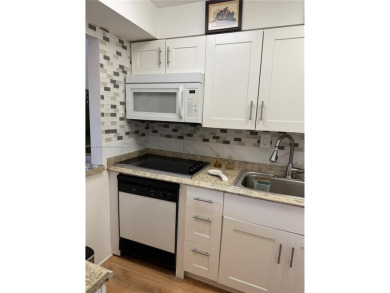 Spacious 1/1 ground floor condo with lots of sunlight and nice on Sunrise Lakes Phase III in Florida - for sale on GolfHomes.com, golf home, golf lot