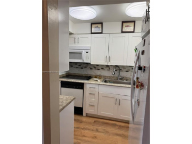 Spacious 1/1 ground floor condo with lots of sunlight and nice on Sunrise Lakes Phase III in Florida - for sale on GolfHomes.com, golf home, golf lot