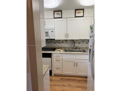 Spacious 1/1 ground floor condo with lots of sunlight and nice on Sunrise Lakes Phase III in Florida - for sale on GolfHomes.com, golf home, golf lot