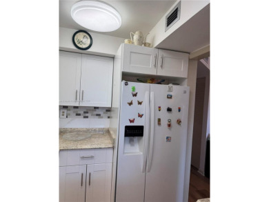 Spacious 1/1 ground floor condo with lots of sunlight and nice on Sunrise Lakes Phase III in Florida - for sale on GolfHomes.com, golf home, golf lot