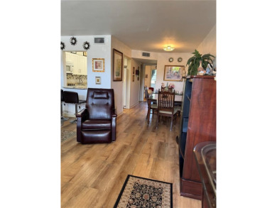 Spacious 1/1 ground floor condo with lots of sunlight and nice on Sunrise Lakes Phase III in Florida - for sale on GolfHomes.com, golf home, golf lot