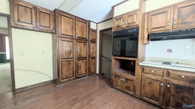 Charming 3BR/2.75BA two-story on .54 acres, perfectly situated on Cherokee Country Club in Alabama - for sale on GolfHomes.com, golf home, golf lot