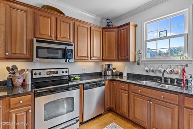 This 3-bedroom, 3-full bathroom, 1-half bathroom, 1,796 heated on Rivers Edge Golf Club in North Carolina - for sale on GolfHomes.com, golf home, golf lot