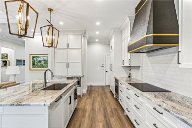 AN EXCEPTIONAL 2023 CUSTOM TRANSFORMATION OF THIS LAKEFRONT HOME on Grand Harbor Golf and Country Club in Florida - for sale on GolfHomes.com, golf home, golf lot