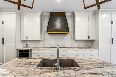 AN EXCEPTIONAL 2023 CUSTOM TRANSFORMATION OF THIS LAKEFRONT HOME on Grand Harbor Golf and Country Club in Florida - for sale on GolfHomes.com, golf home, golf lot