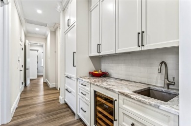AN EXCEPTIONAL 2023 CUSTOM TRANSFORMATION OF THIS LAKEFRONT HOME on Grand Harbor Golf and Country Club in Florida - for sale on GolfHomes.com, golf home, golf lot