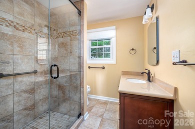 Perched above the Black Mountain Golf Club and nestled within a on Black Mountain Golf Course in North Carolina - for sale on GolfHomes.com, golf home, golf lot