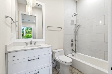 AN EXCEPTIONAL 2023 CUSTOM TRANSFORMATION OF THIS LAKEFRONT HOME on Grand Harbor Golf and Country Club in Florida - for sale on GolfHomes.com, golf home, golf lot