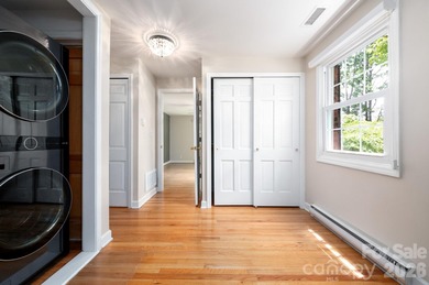 Perched above the Black Mountain Golf Club and nestled within a on Black Mountain Golf Course in North Carolina - for sale on GolfHomes.com, golf home, golf lot