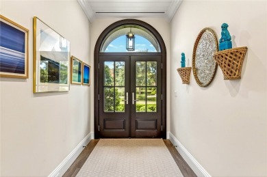 AN EXCEPTIONAL 2023 CUSTOM TRANSFORMATION OF THIS LAKEFRONT HOME on Grand Harbor Golf and Country Club in Florida - for sale on GolfHomes.com, golf home, golf lot