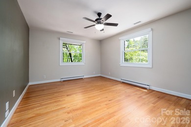 Perched above the Black Mountain Golf Club and nestled within a on Black Mountain Golf Course in North Carolina - for sale on GolfHomes.com, golf home, golf lot