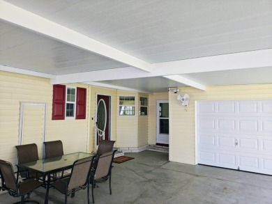 This incredible floor plan has an entry foyer and includes an on Southport Springs Golf Club in Florida - for sale on GolfHomes.com, golf home, golf lot