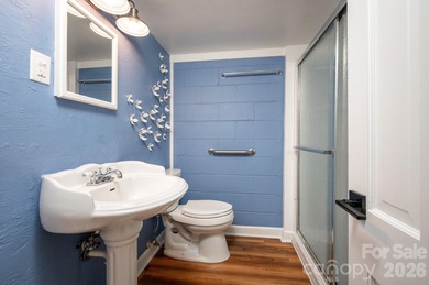 Perched above the Black Mountain Golf Club and nestled within a on Black Mountain Golf Course in North Carolina - for sale on GolfHomes.com, golf home, golf lot