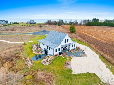 Discover luxury and serenity in this stunning new custom-built on CNC Links in Wisconsin - for sale on GolfHomes.com, golf home, golf lot