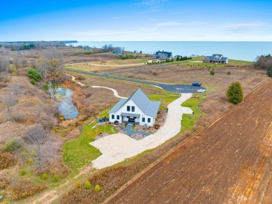 Discover luxury and serenity in this stunning new custom-built on CNC Links in Wisconsin - for sale on GolfHomes.com, golf home, golf lot