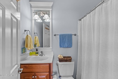 This 3-bedroom, 3-full bathroom, 1-half bathroom, 1,796 heated on Rivers Edge Golf Club in North Carolina - for sale on GolfHomes.com, golf home, golf lot