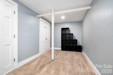 Perched above the Black Mountain Golf Club and nestled within a on Black Mountain Golf Course in North Carolina - for sale on GolfHomes.com, golf home, golf lot