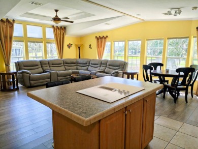 This incredible floor plan has an entry foyer and includes an on Southport Springs Golf Club in Florida - for sale on GolfHomes.com, golf home, golf lot