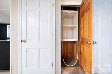 Perched above the Black Mountain Golf Club and nestled within a on Black Mountain Golf Course in North Carolina - for sale on GolfHomes.com, golf home, golf lot