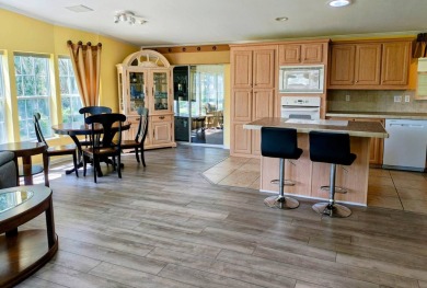 This incredible floor plan has an entry foyer and includes an on Southport Springs Golf Club in Florida - for sale on GolfHomes.com, golf home, golf lot