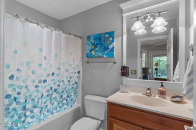 This 3-bedroom, 3-full bathroom, 1-half bathroom, 1,796 heated on Rivers Edge Golf Club in North Carolina - for sale on GolfHomes.com, golf home, golf lot