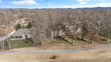 This beautifully situated home in Tellico Village offers prime on Toqua Golf Course - Loudon County in Tennessee - for sale on GolfHomes.com, golf home, golf lot