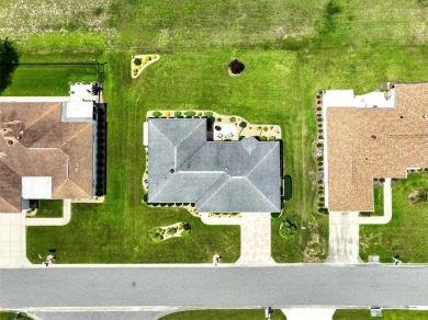 Meticulously Maintained Home with Golf Course Views in 55+ Gated on The Links of Spruce Creek in Florida - for sale on GolfHomes.com, golf home, golf lot