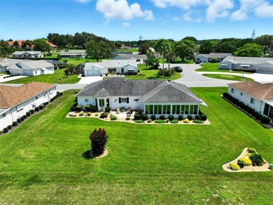 Meticulously Maintained Home with Golf Course Views in 55+ Gated on The Links of Spruce Creek in Florida - for sale on GolfHomes.com, golf home, golf lot