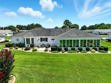 Meticulously Maintained Home with Golf Course Views in 55+ Gated on The Links of Spruce Creek in Florida - for sale on GolfHomes.com, golf home, golf lot