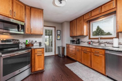Welcome to this charming ranch-style home overlooking the on Darlington Country Club in Wisconsin - for sale on GolfHomes.com, golf home, golf lot