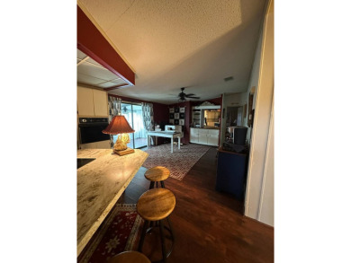 Nestled on a curve for added privacy, this beautifully upgraded on Schalamar Creek Golf and Country Club in Florida - for sale on GolfHomes.com, golf home, golf lot