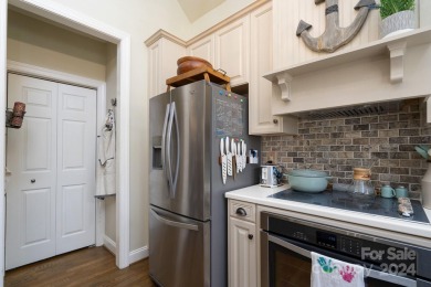 Enjoy maintenance-free lock-&-leave living at 412 Millingport on Old North State Club at Uwharrie Point Golf community in North Carolina - for sale on GolfHomes.com, golf home, golf lot