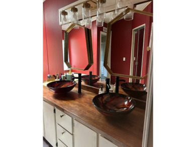 Nestled on a curve for added privacy, this beautifully upgraded on Schalamar Creek Golf and Country Club in Florida - for sale on GolfHomes.com, golf home, golf lot