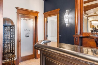Absolutely stunning home perched above the signature 17th hole on Buffalo Ridge Springs Golf Club in Missouri - for sale on GolfHomes.com, golf home, golf lot