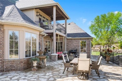 Absolutely stunning home perched above the signature 17th hole on Buffalo Ridge Springs Golf Club in Missouri - for sale on GolfHomes.com, golf home, golf lot