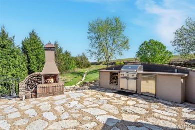 Absolutely stunning home perched above the signature 17th hole on Buffalo Ridge Springs Golf Club in Missouri - for sale on GolfHomes.com, golf home, golf lot