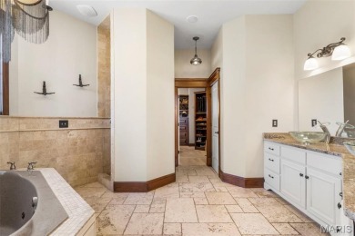 Absolutely stunning home perched above the signature 17th hole on Buffalo Ridge Springs Golf Club in Missouri - for sale on GolfHomes.com, golf home, golf lot