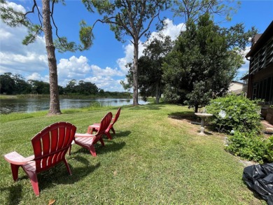 Lake Sparkle OASIS Water front living!!! Just a few miles from on Country Club At Silver Springs Shores in Florida - for sale on GolfHomes.com, golf home, golf lot