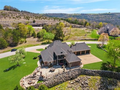 Absolutely stunning home perched above the signature 17th hole on Buffalo Ridge Springs Golf Club in Missouri - for sale on GolfHomes.com, golf home, golf lot
