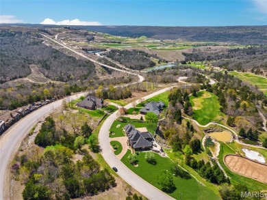 Absolutely stunning home perched above the signature 17th hole on Buffalo Ridge Springs Golf Club in Missouri - for sale on GolfHomes.com, golf home, golf lot