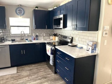 Lot Rent Only $575/Month!    Welcome to your perfect vacation on Crystal Lake Club in Florida - for sale on GolfHomes.com, golf home, golf lot