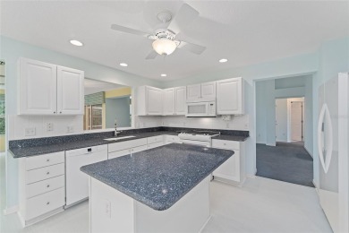 The first time offered for sale since new, this expanded on The Links of Spruce Creek in Florida - for sale on GolfHomes.com, golf home, golf lot