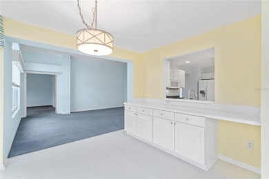 The first time offered for sale since new, this expanded on The Links of Spruce Creek in Florida - for sale on GolfHomes.com, golf home, golf lot