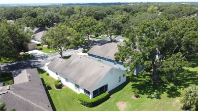 Popular Canterbury model with a private back located in 55+ on Kings Ridge Golf Club in Florida - for sale on GolfHomes.com, golf home, golf lot