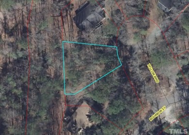 Wooded lot in a gated golf community! Great location. Close to on Carolina Trace Country Club in North Carolina - for sale on GolfHomes.com, golf home, golf lot