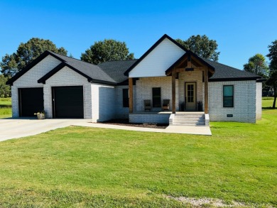 Luxury Home on Coopers Hawk Golf Course in Melbourne, AR for Sale for sale on GolfHomes.com